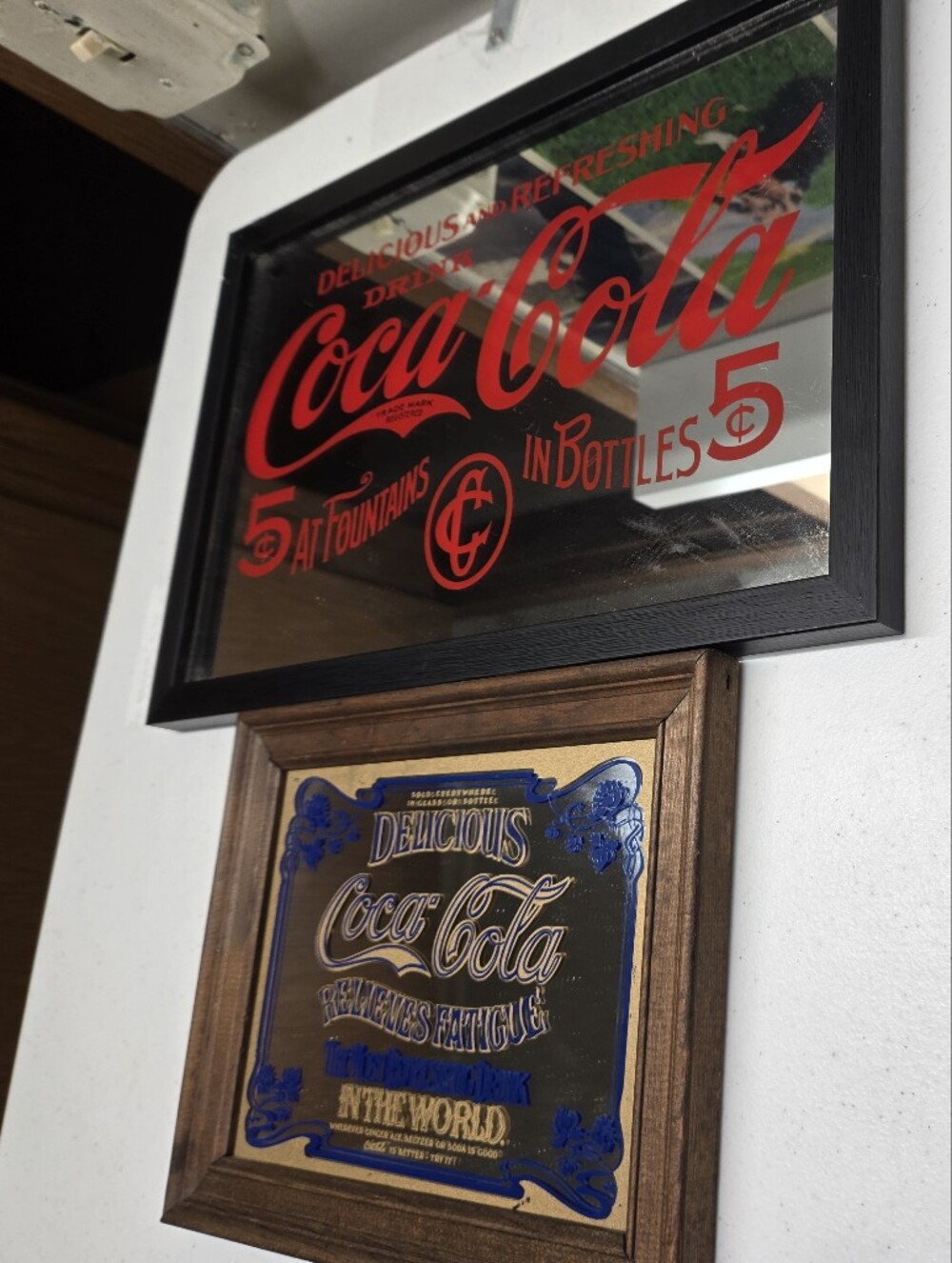 These two Coca-Cola mirrors are in nice condition for their age. Measurements ar